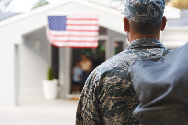 caucasian-male-soldier-with-son-and-wife-outside-h-2023-11-27-04-55-52-utc-2.jpg