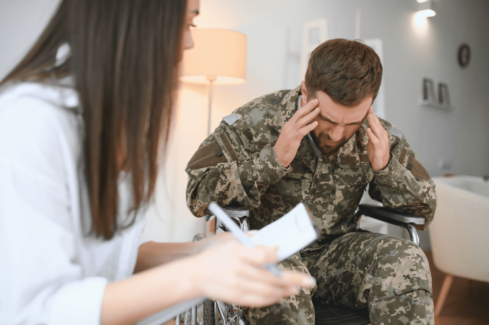 young-soldier-in-wheelchair-at-psychologist-s-offi-2024-07-03-04-26-49-utc-1-3-2.png