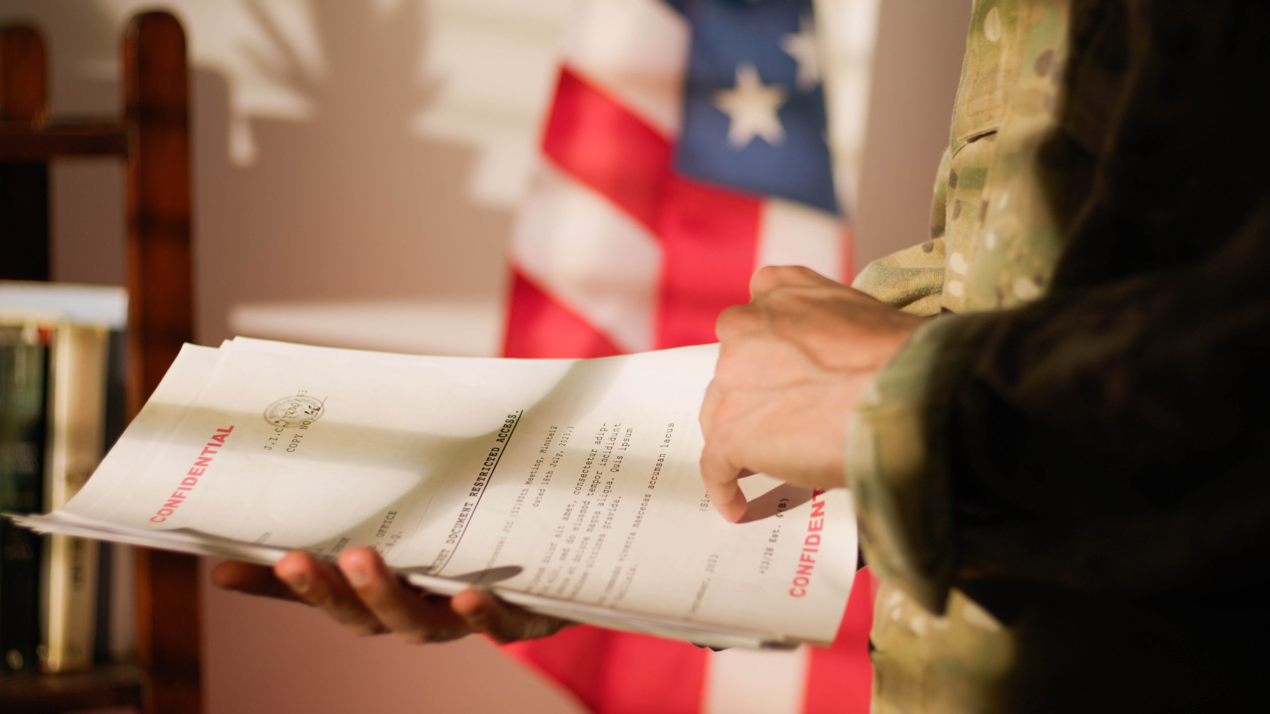 officer-of-united-states-america-reads-confidentia-2025-03-09-01-39-35-utc-1-scaled.jpg