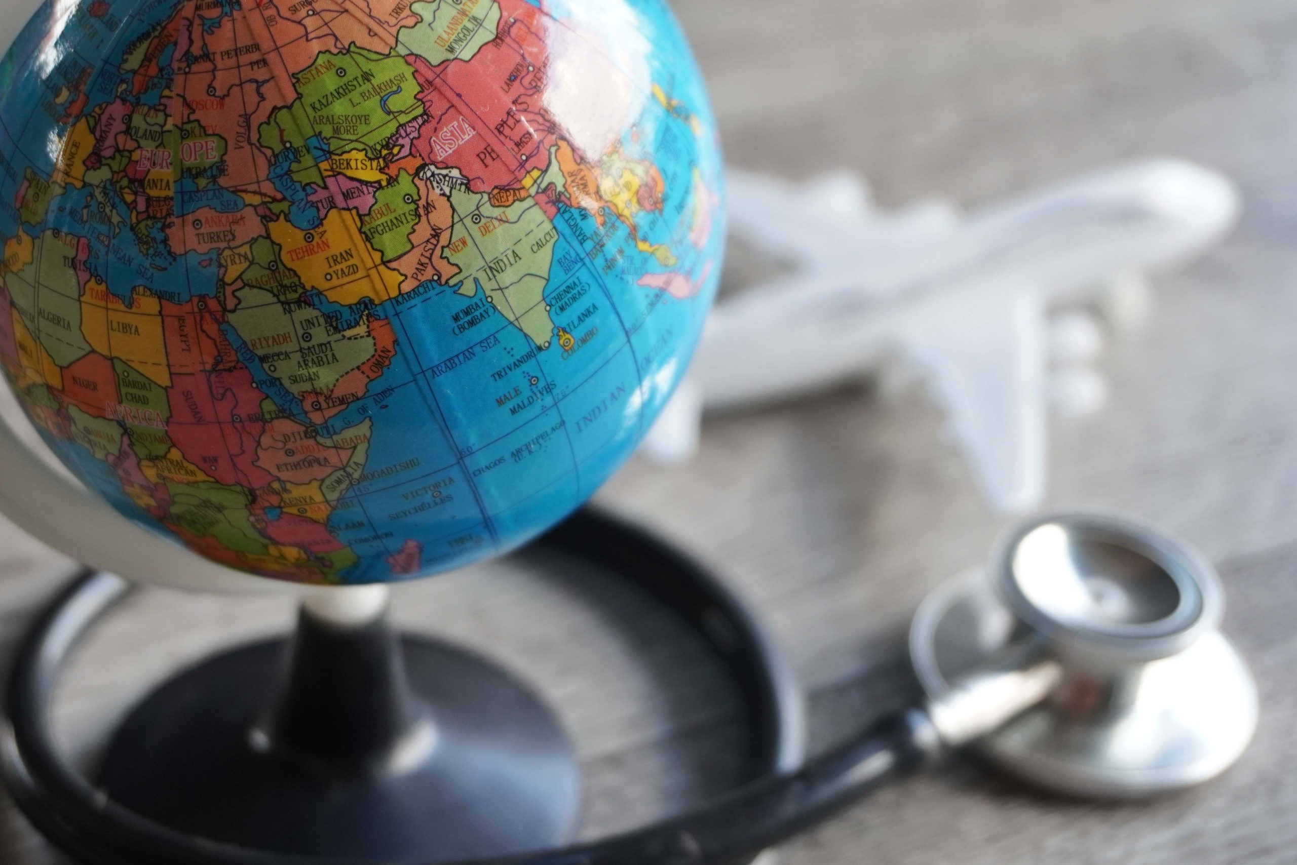 selective-focus-image-of-globe-toy-plane-and-stet-2025-03-14-21-41-13-utc-scaled.jpeg