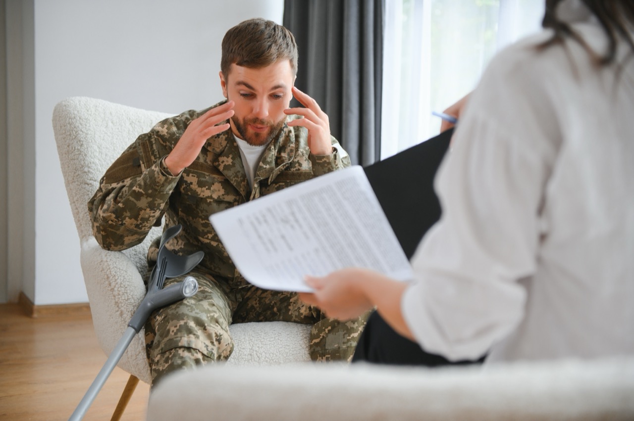 sad-male-soldier-on-appointment-with-psychologist-2025-03-14-14-26-47-utc.jpg