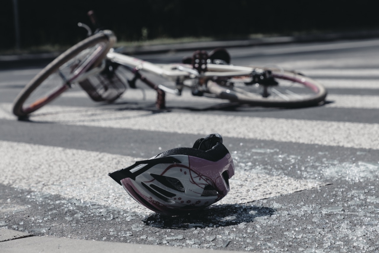 broken-child-s-helmet-and-bike-on-pedestrian-cross-2026-01-05-06-26-17-utc.jpg